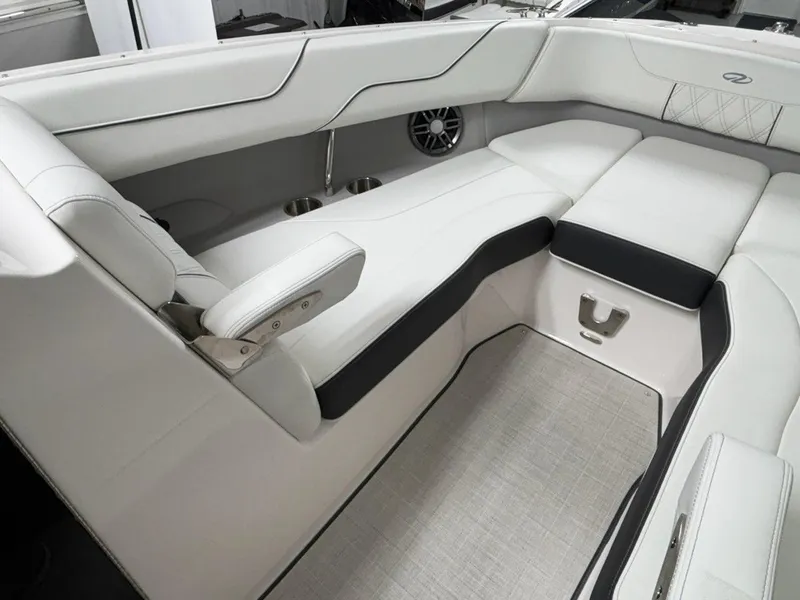 Slide: The Image of Luxurious interior of 2026 Regal LX6 boat with plush white seating. - 19