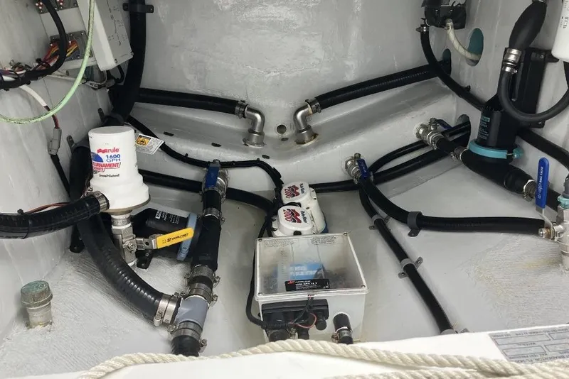 Slide: The Image of Bilge area of a 2012 Yellowfin 42 Offshore boat with pumps and hoses. - 13