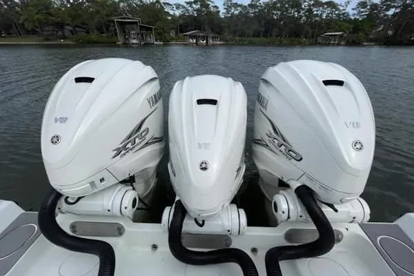 Slide: The Image of Triple Yamaha V8 engines on a 2012 Yellowfin 42 Offshore boat. - 14