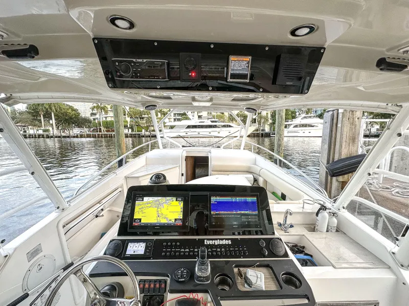 Slide: The Image of Cockpit view of 2017 Everglades 360 LXC boat with advanced navigation system. - 16