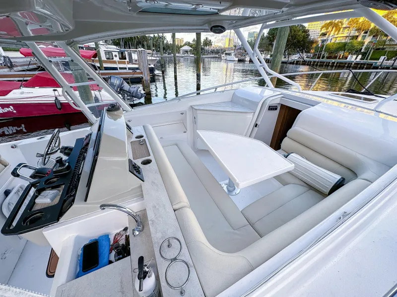 Slide: The Image of Luxurious 2017 Everglades 360 LXC boat interior with plush seating and sleek design. - 20