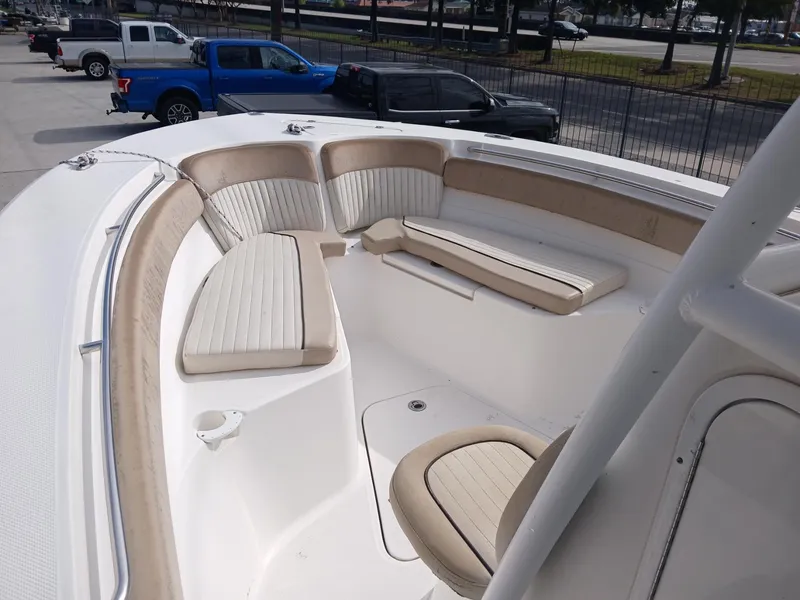 Slide: The Image of 2015 Sea Fox 286 Commander boat interior with cushioned seating. - 11