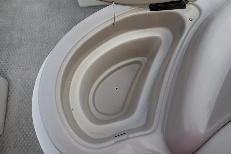 Slide: The Image of Storage compartment on a 2005 Crest 25 Caribbean boat. - 33