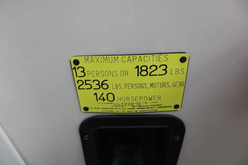 Slide: The Image of 2005 Crest 25 Caribbean capacity plate: 13 persons, 1823 lbs, 2536 lbs total, 140 horsepower. - 35