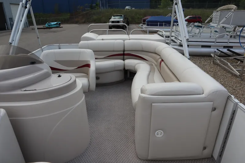 Slide: The Image of 2005 Crest 25 Caribbean pontoon boat with spacious seating and modern design. - 37