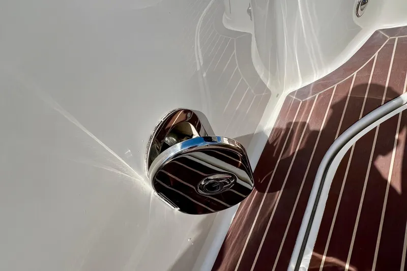 Slide: The Image of Chrome fitting on 2010 Sea Ray 350 Sundancer boat with wooden deck. - 21