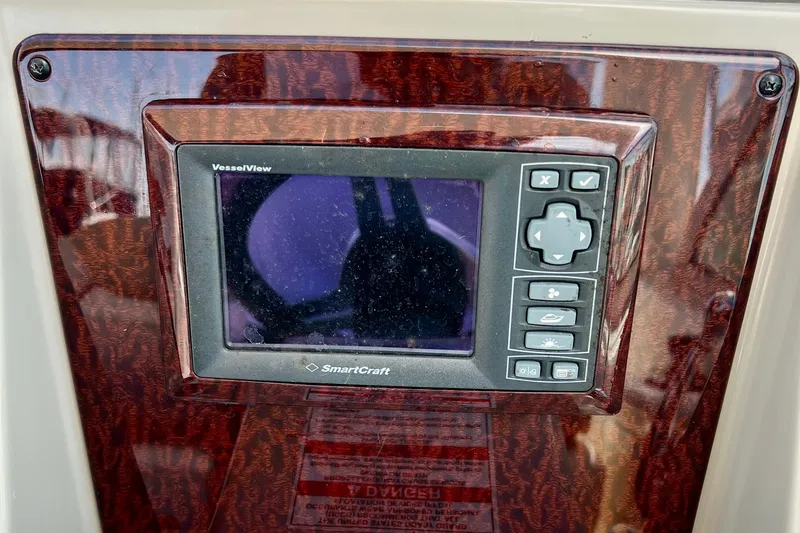 Slide: The Image of SmartCraft VesselView display on 2010 Sea Ray 350 Sundancer boat dashboard. - 34