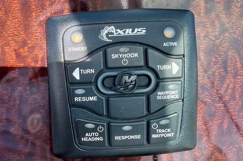 Slide: The Image of Control panel of a 2010 Sea Ray 350 Sundancer boat with Axius system. - 38