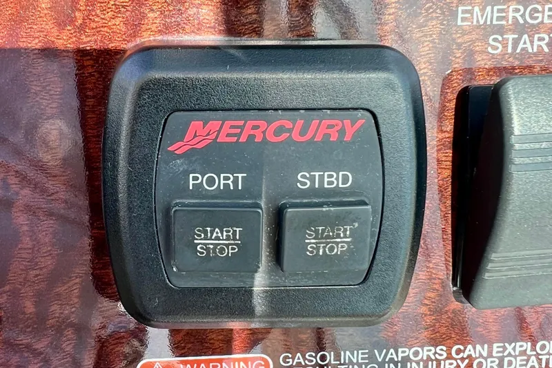 Slide: The Image of Mercury engine control panel on 2010 Sea Ray 350 Sundancer boat dashboard. - 39