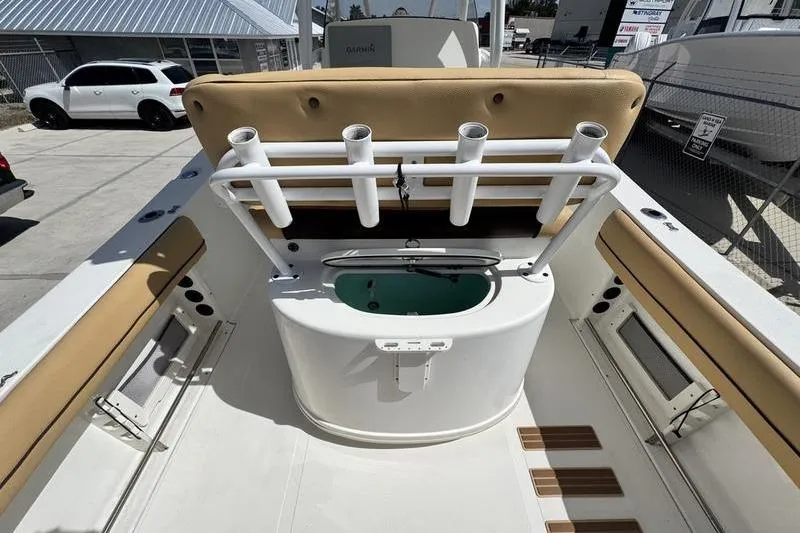 Slide: The Image of 2016 NauticStar 25 XS boat interior with rod holders and seating. - 29