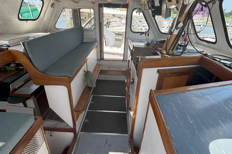 Slide: The Image of Interior of 1985 Rosborough RF-35 Atlantic Trawler with wooden accents and seating area. - 10