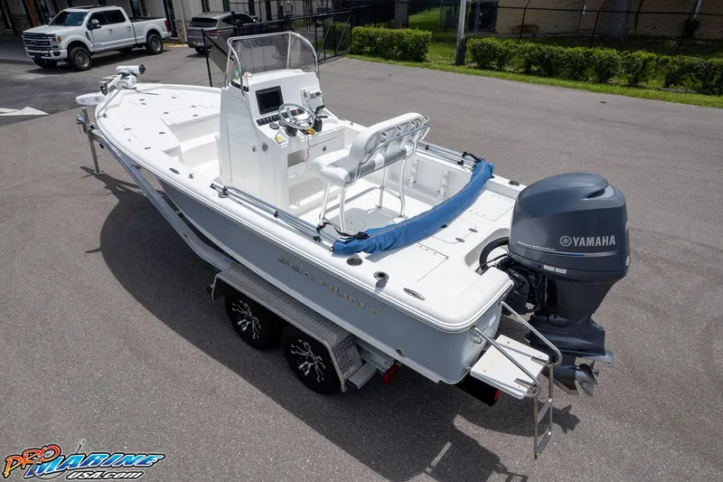 Slide: The Image of 2015 Sea Hunt BX 20 BR boat with Yamaha outboard motor on a trailer. - 12