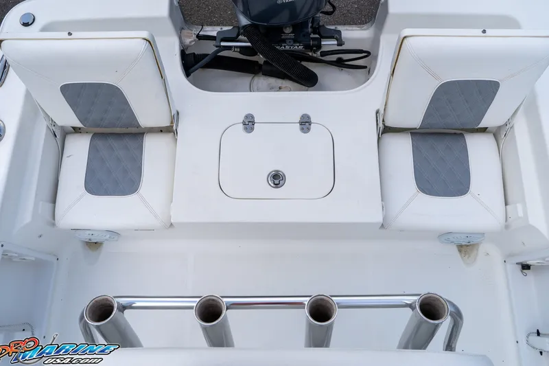 Slide: The Image of 2015 Sea Hunt BX 20 BR boat interior with seating and rod holders. - 17