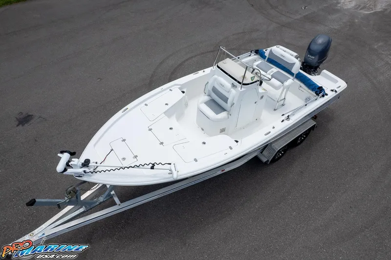 Slide: The Image of 2015 Sea Hunt BX 20 BR boat on trailer, aerial view, white hull, outboard motor. - 3