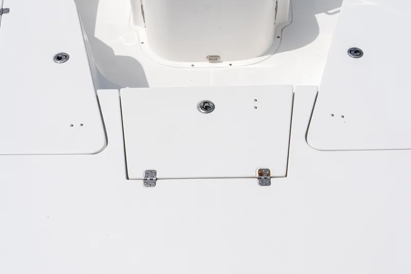 Slide: The Image of 2015 Sea Hunt BX 20 BR boat deck with storage compartments. - 31