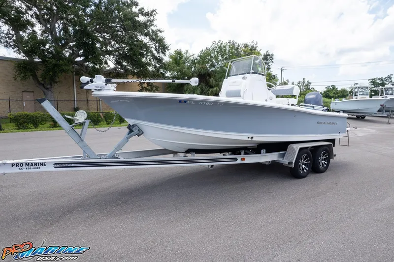 Slide: The Image of 2015 Sea Hunt BX 20 BR boat on trailer in parking lot. - 42