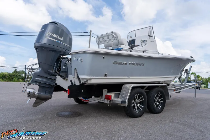 Slide: The Image of 2015 Sea Hunt BX 20 BR boat on trailer with Yamaha outboard motor. - 9