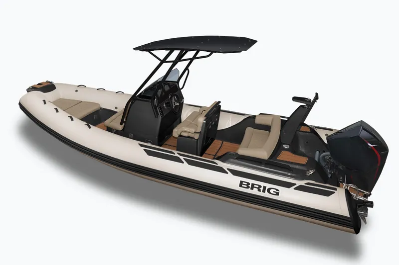 The Image of 2026 Brig Eagle 6.7 boat with sleek design, beige seating, and modern console. - 1