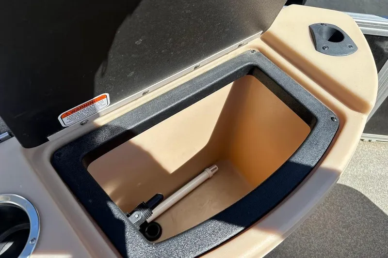 Slide: The Image of Open storage compartment on 2019 Sun Tracker Bass Buggy 18 DLX boat. - 18