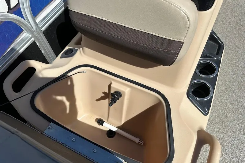 Slide: The Image of 2019 Sun Tracker Bass Buggy 18 DLX seat with storage compartment and cup holders. - 24