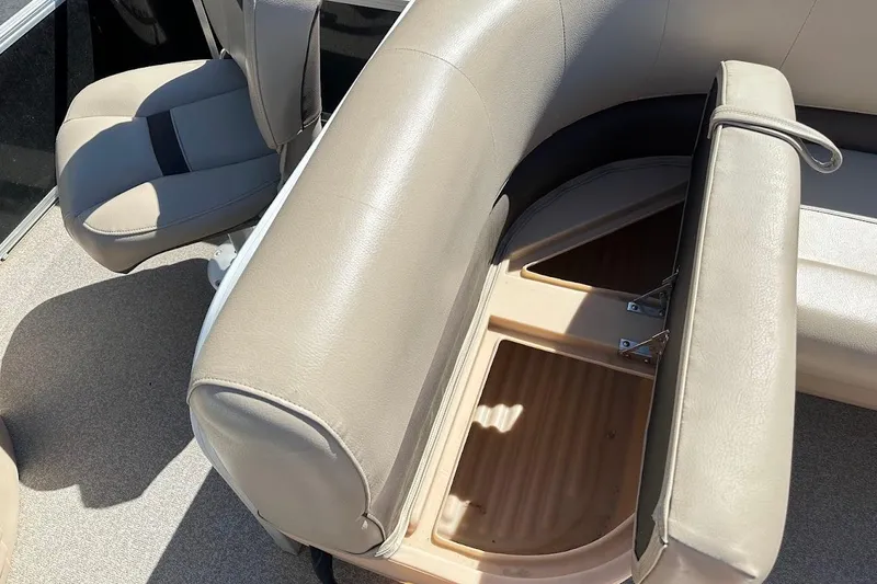 Slide: The Image of 2019 Sun Tracker Bass Buggy 18 DLX boat interior with open storage compartment. - 25