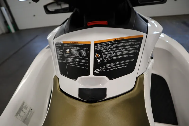 Slide: The Image of 2013 Sea-Doo GTX 215 dashboard with safety warnings and instructions. - 18