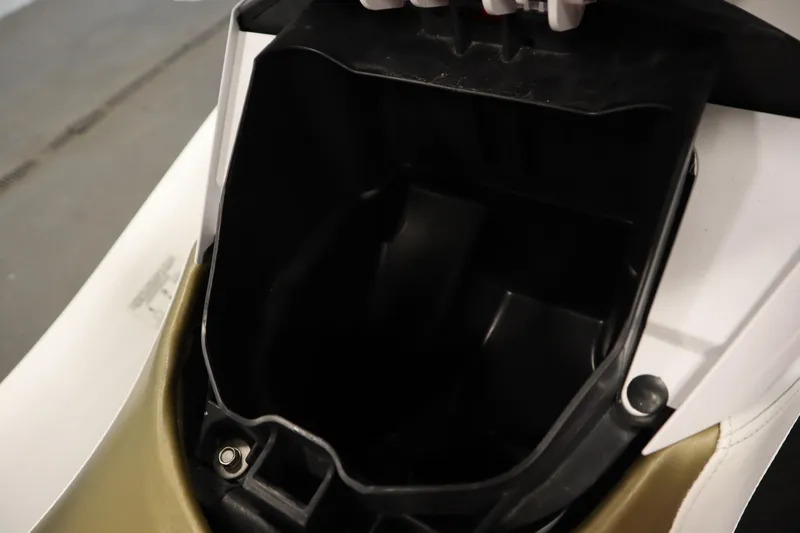 Slide: The Image of Open storage compartment of 2013 Sea-Doo GTX 215 watercraft. - 19
