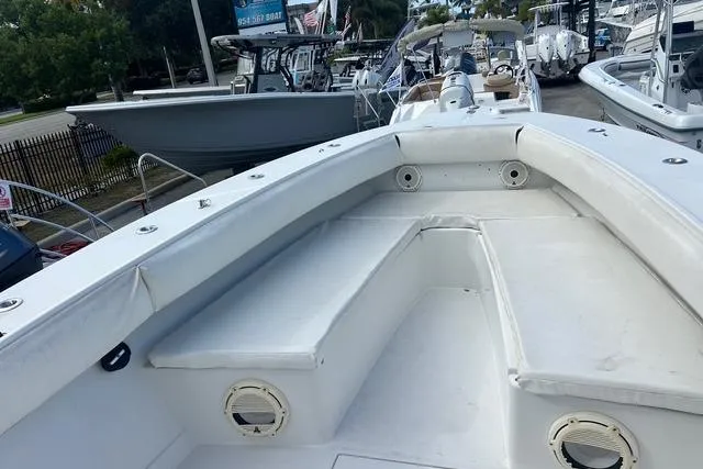 Slide: The Image of 2004 Jupiter 31 Center Console boat with spacious seating and sleek design. - 20