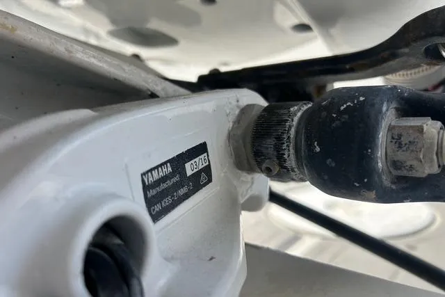 Slide: The Image of Close-up of Yamaha engine part on 2004 Jupiter 31 Center Console boat. - 34