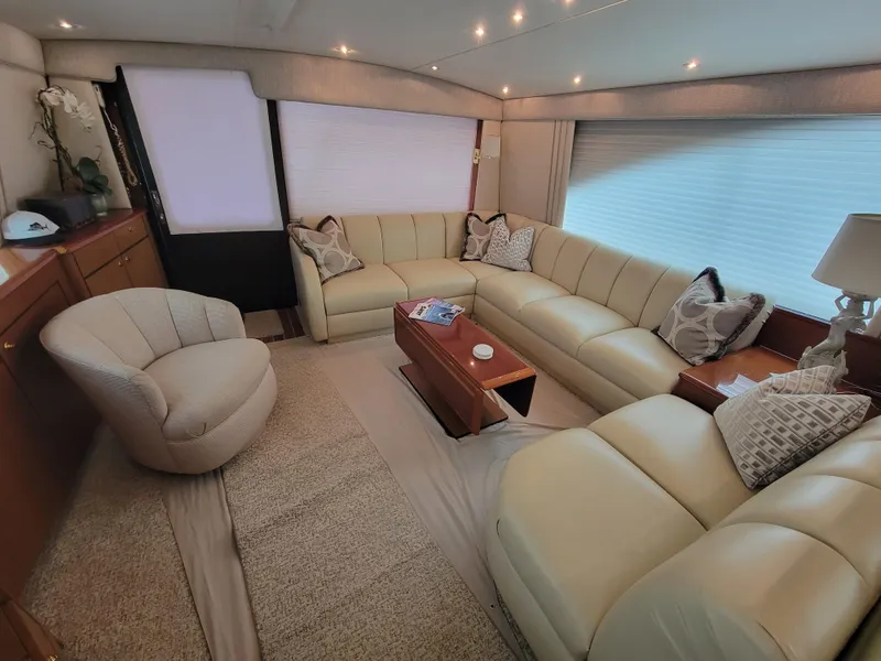 Slide: The Image of Luxurious interior of a 2001 Ocean Yachts 56 Super Sport with cream leather seating. - 15