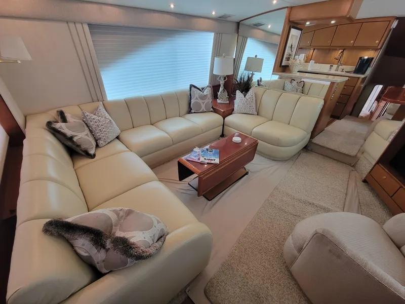 Slide: The Image of Luxurious interior of a 2001 Ocean Yachts 56 Super Sport with cream leather seating. - 16