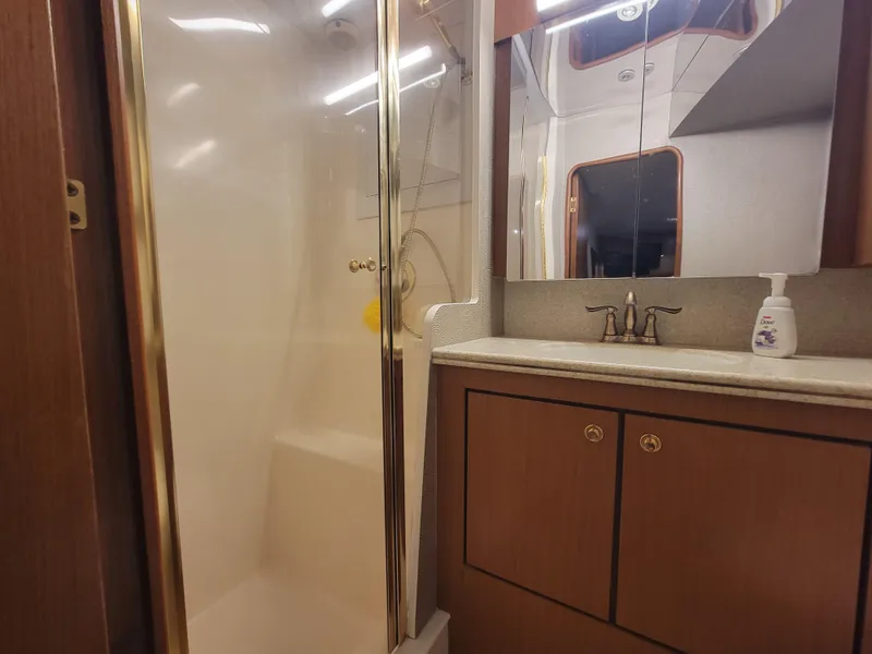 Slide: The Image of Bathroom interior of a 2001 Ocean Yachts 56 Super Sport with shower and vanity. - 27