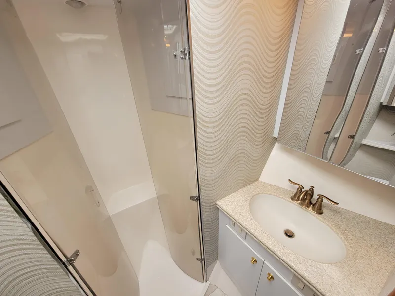 Slide: The Image of Bathroom interior of 2001 Ocean Yachts 56 Super Sport with shower and sink. - 33