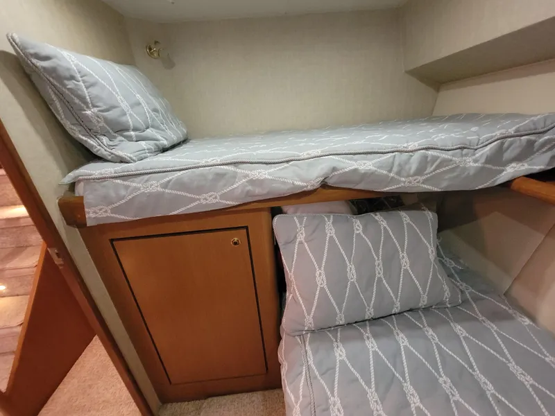 Slide: The Image of Bunk beds in the 2001 Ocean Yachts 56 Super Sport cabin. - 34