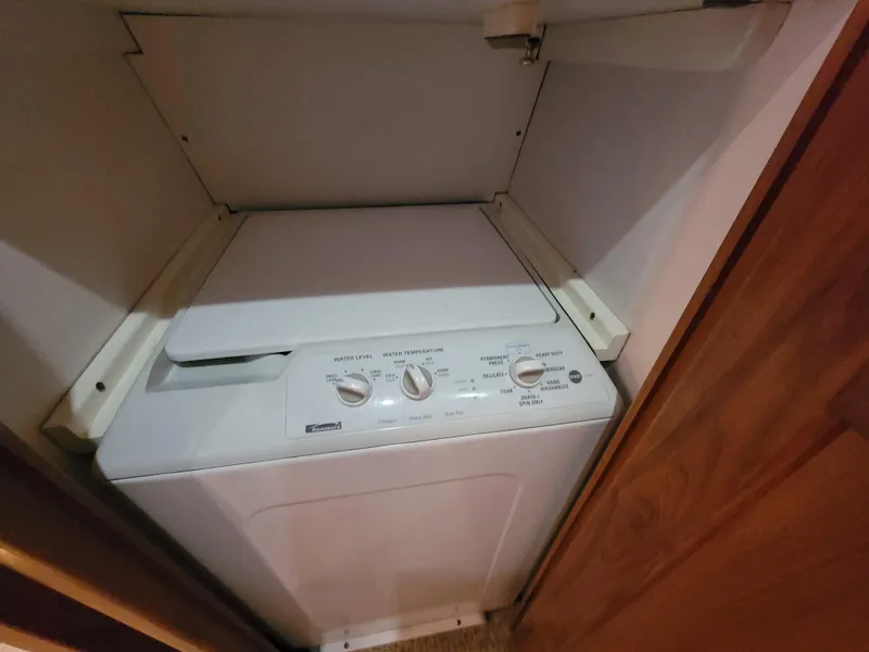 Slide: The Image of Compact washing machine in 2001 Ocean Yachts 56 Super Sport. - 41