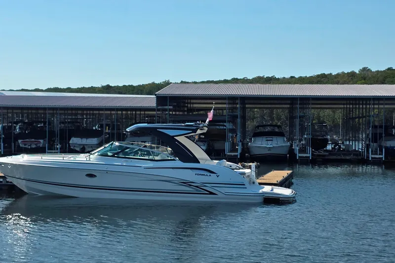 Slide: The Image of 2026 Formula 350 Crossover Bowrider I/O with luxurious white seating and modern design. - 15