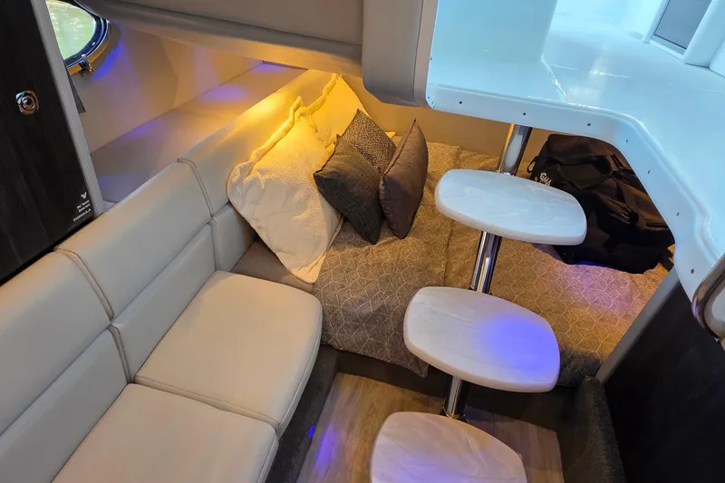 Slide: The Image of Manufacturer Provided Image: 2026 Formula 350 Crossover Bowrider I/O dashboard with ocean view and passengers relaxing. - 39