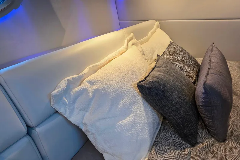 Slide: The Image of Manufacturer Provided Image: 2026 Formula 350 Crossover Bowrider I/O interior with kitchenette, seating, and modern amenities. - 42