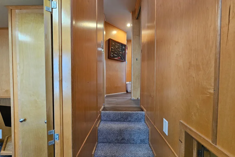 Slide: The Image of Narrow hallway with wooden walls and carpeted steps in a 2001 Fantasy model. - 35