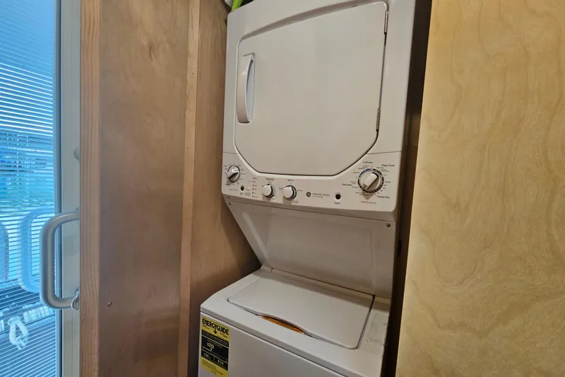 Slide: The Image of Stacked washer and dryer unit in a compact laundry space, Fantasy model 18x80, 2001. - 41