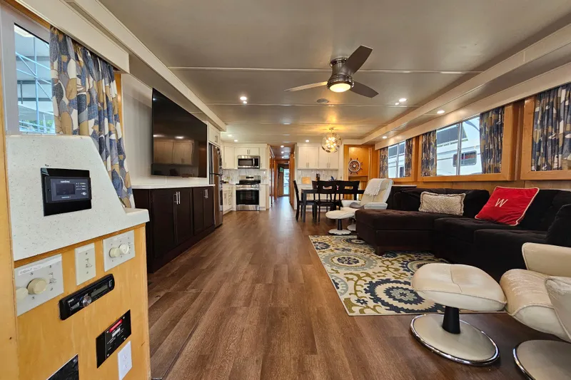 Slide: The Image of Luxurious houseboat interior with modern furnishings, large windows, and stylish decor, Fantasy 18x80, 2001. - 8