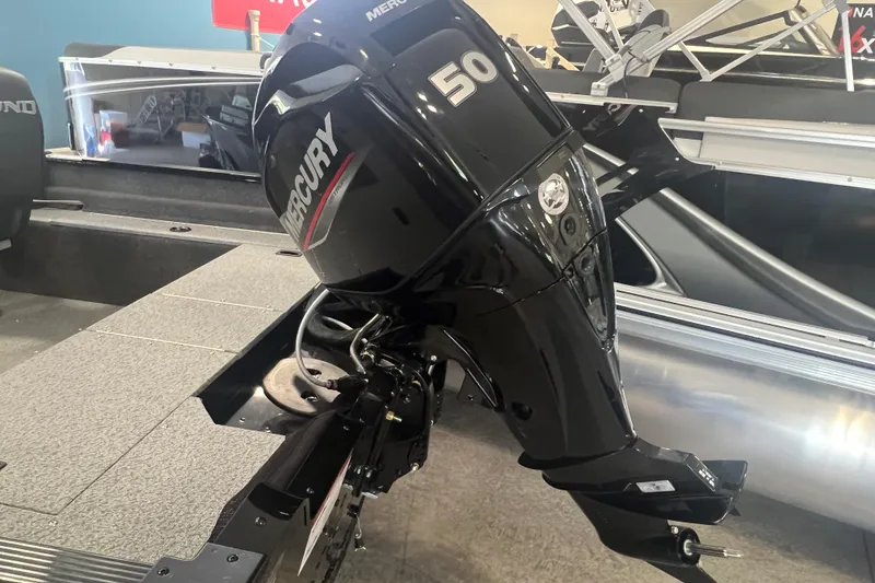 Slide: The Image of 2025 Lund 1650 Angler SS with Mercury 50 outboard motor in showroom. - 3