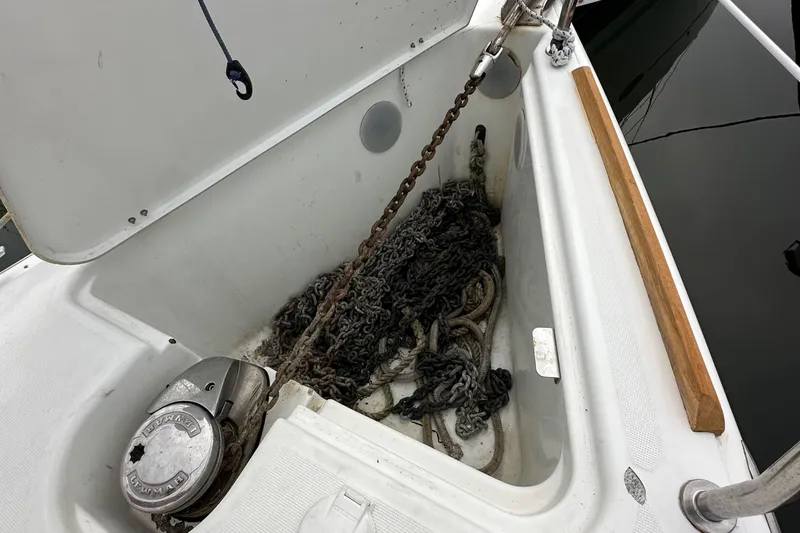 Slide: The Image of Anchor locker of 2011 Jeanneau Sun Odyssey 33i with chain and rope. - 25