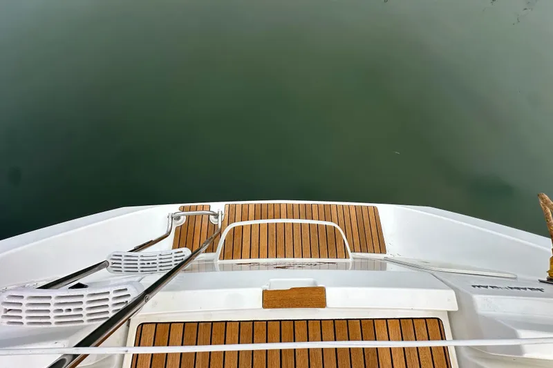 Slide: The Image of Stern view of 2011 Jeanneau Sun Odyssey 33i with teak deck and swim platform. - 34