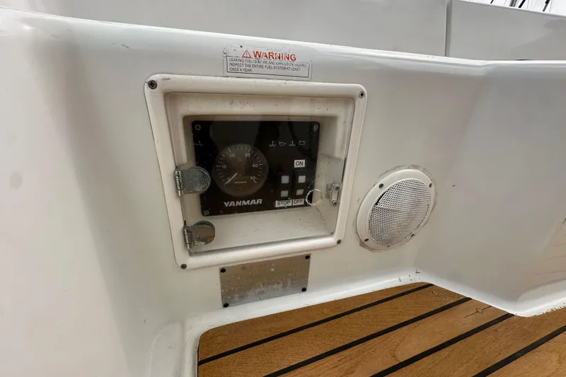Slide: The Image of Yanmar engine control panel on 2011 Jeanneau Sun Odyssey 33i sailboat. - 36