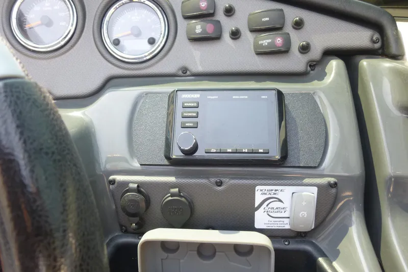 Slide: The Image of Dashboard of 2014 Yamaha Boats 240 with gauges and control panel. - 6