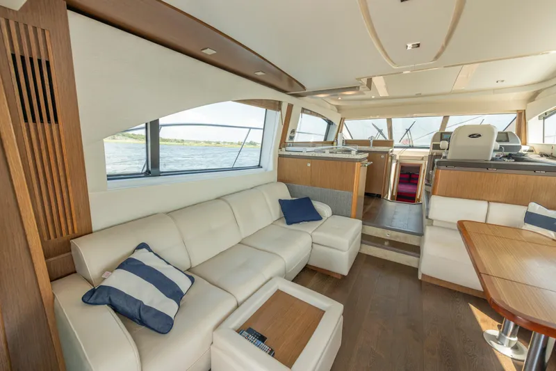Slide: The Image of Luxurious interior of 2017 Sea Ray Fly 510 yacht with elegant seating and modern design. - 30