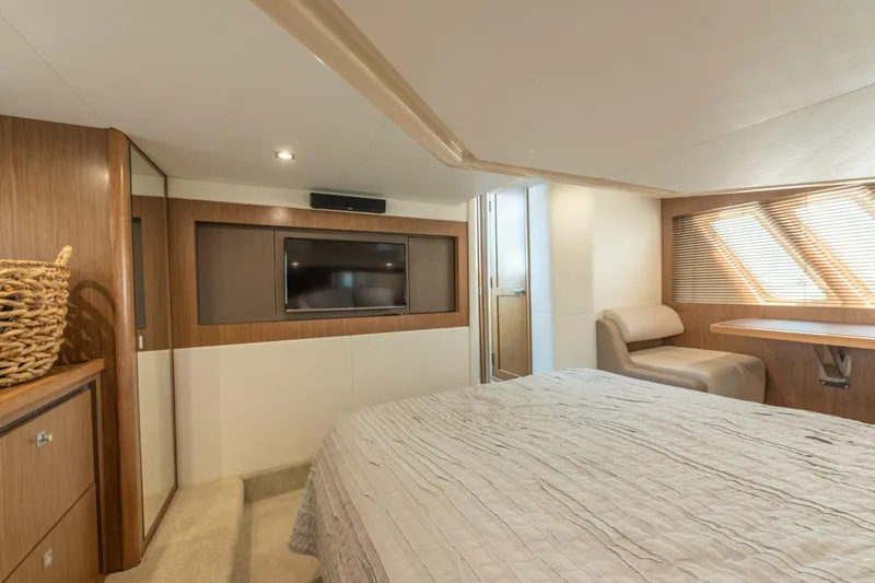 Slide: The Image of Luxurious interior of 2017 Sea Ray Fly 510 yacht with modern furnishings and natural light. - 53