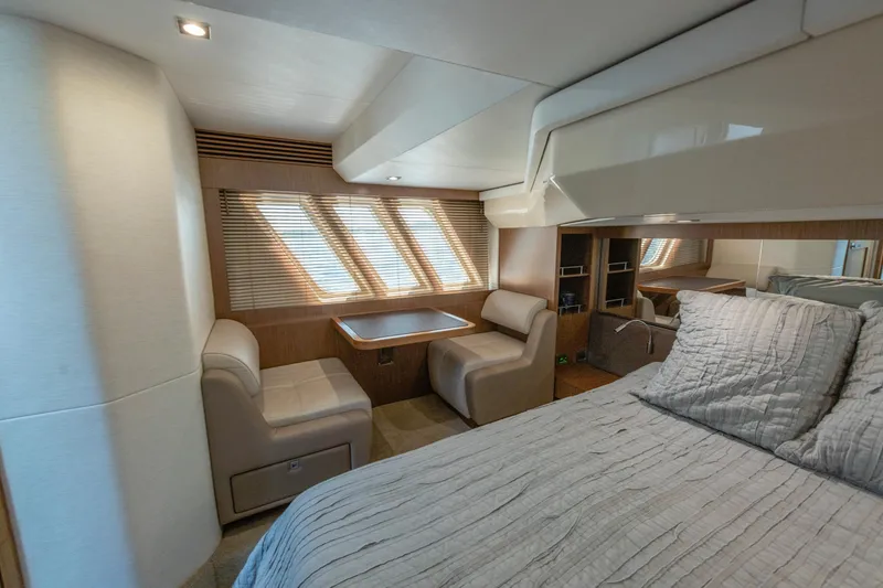 Slide: The Image of Luxurious interior of 2017 Sea Ray Fly 510 yacht with cozy seating and elegant decor. - 55
