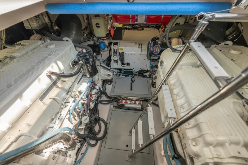 Slide: The Image of Engine room of 2017 Sea Ray Fly 510 yacht, showcasing mechanical components and equipment. - 87